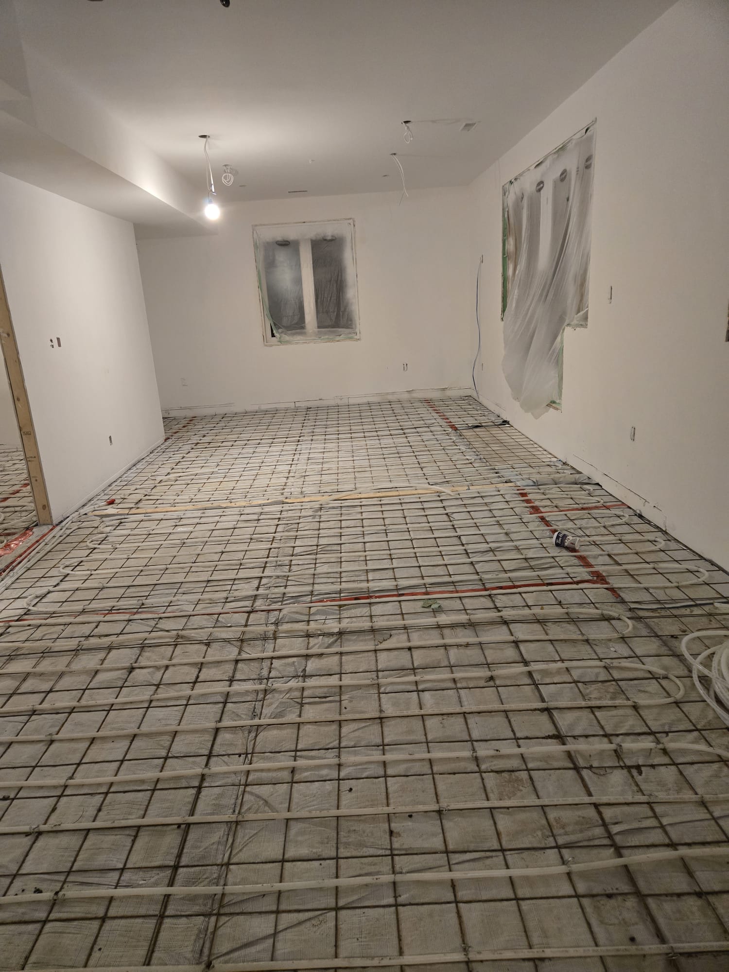 Basement in-floor heating installation in Richmond Hill